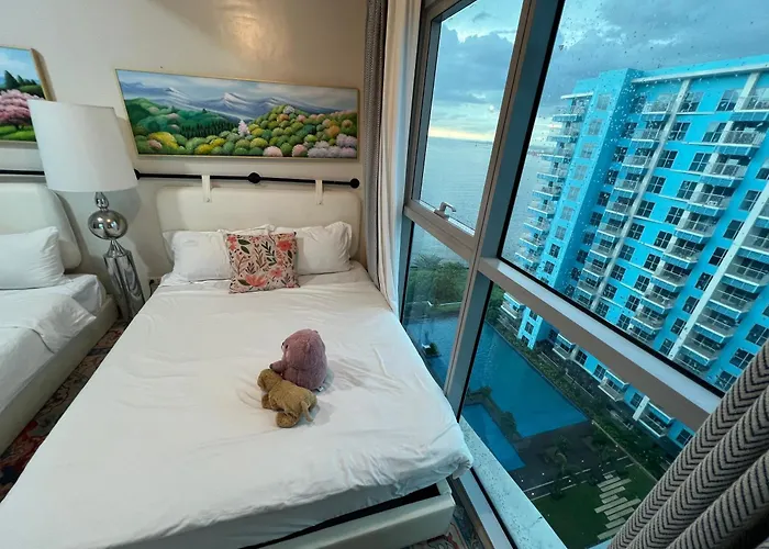 Cozy Family 1br Seaview Casino & Pool View Retreat شقة فندقية مانيلا