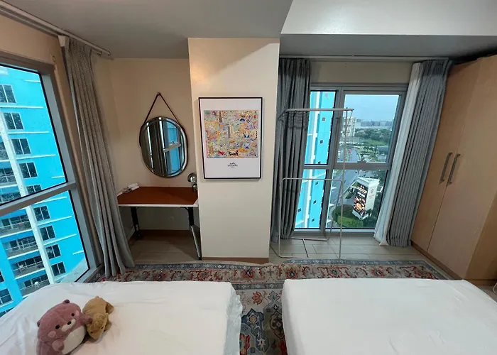 Cozy Family 1br Seaview Casino & Pool View Retreat شقة فندقية مانيلا